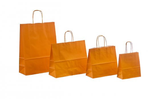 Бумажные крафт-пакеты оранжевого цвета.